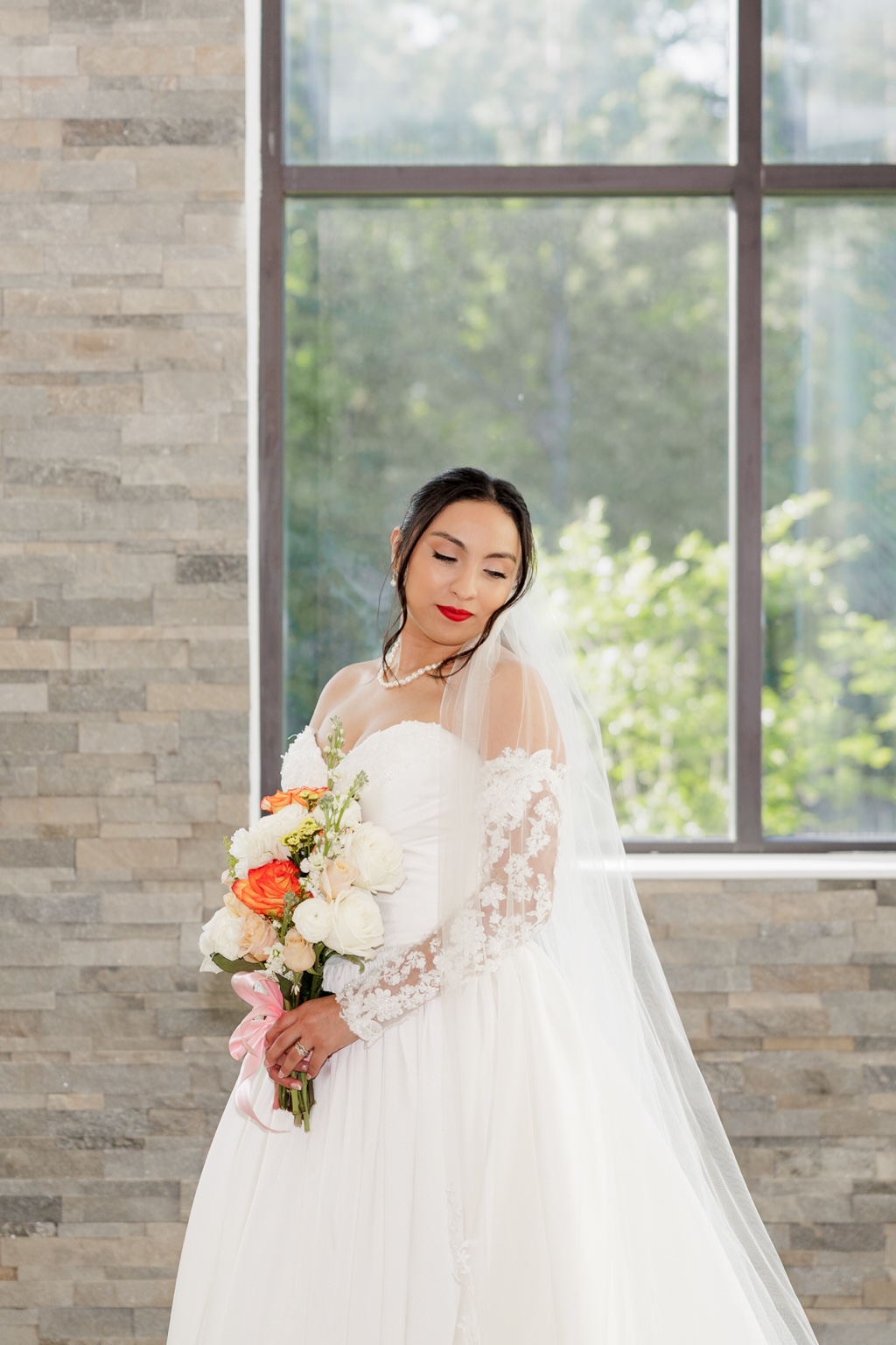 Bride at The Grand Pines Reserve in Conroe, Texas, with wedding hair and makeup by Project Artistry