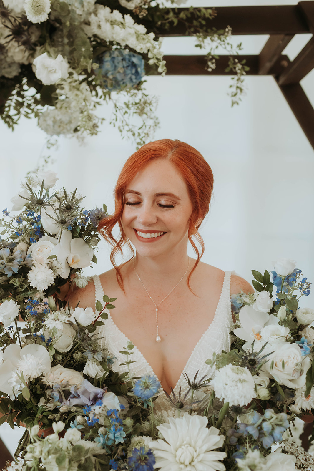 Bride with romantic wedding hair and soft bridal makeup by Project Artistry